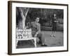 Surrealist Artist Salvador Dali with His Wife Gala in a Garden-Martha Holmes-Framed Premium Photographic Print