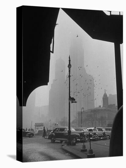 Surrounding the City in Fog, with City Hall and Woolworth Building in Background-Walter Sanders-Stretched Canvas