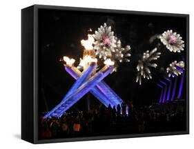 Surrounding the Olympic Flame as Fireworks Explode after the Opening Ceremony of 2010 Winter Games-null-Framed Stretched Canvas