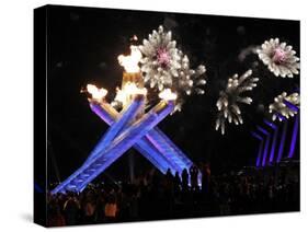 Surrounding the Olympic Flame as Fireworks Explode after the Opening Ceremony of 2010 Winter Games-null-Stretched Canvas