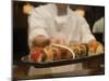 Sushi Chef Presents a Plate of Various Seafood Sushi, Japan, Asia-Aaron McCoy-Mounted Photographic Print