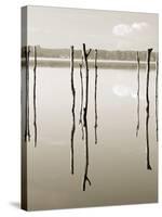 “Suspended in the Air” – Reflected in Water Remains of the Old Jetty on the-Nadia Isakova-Stretched Canvas