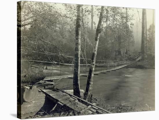 Suspension Bridge, Lake Crescent Road, 1918-Asahel Curtis-Stretched Canvas