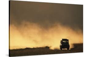 Suv Driving across Savanna-null-Stretched Canvas