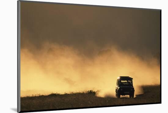 Suv Driving across Savanna-null-Mounted Photographic Print