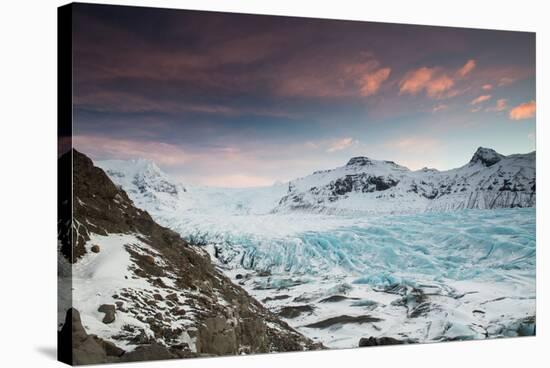 Svinafellsjokull glacier at sunrise in the Skaftafell National Park in southern Iceland.-Alex Saberi-Stretched Canvas