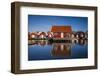 Sweden, Bohuslan, Kungshamn, red fishing shacks in the Fisketangen, old fisherman's neighborhood-Walter Bibikow-Framed Photographic Print