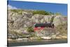 Sweden, Bohuslan, Marstrand, red coastal fishing shack-Walter Bibikow-Stretched Canvas