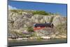 Sweden, Bohuslan, Marstrand, red coastal fishing shack-Walter Bibikow-Mounted Photographic Print