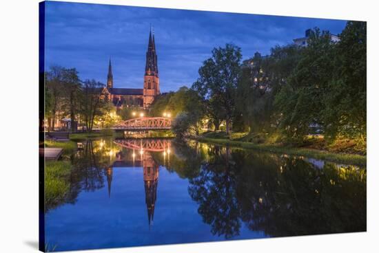 Sweden, Central Sweden, Uppsala, Domkyrka Cathedral, reflection, dusk-Walter Bibikow-Stretched Canvas