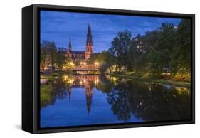 Sweden, Central Sweden, Uppsala, Domkyrka Cathedral, reflection, dusk-Walter Bibikow-Framed Stretched Canvas