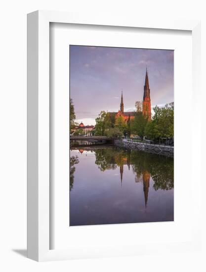 Sweden, Central Sweden, Uppsala, Domkyrka Cathedral, reflection, dusk-Walter Bibikow-Framed Photographic Print
