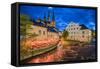 Sweden, Central Sweden, Uppsala, Domkyrka Cathedral with riverfront cafe, dusk-Walter Bibikow-Framed Stretched Canvas