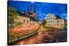 Sweden, Central Sweden, Uppsala, Domkyrka Cathedral with riverfront cafe, dusk-Walter Bibikow-Stretched Canvas