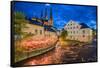 Sweden, Central Sweden, Uppsala, Domkyrka Cathedral with riverfront cafe, dusk-Walter Bibikow-Framed Stretched Canvas