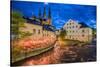 Sweden, Central Sweden, Uppsala, Domkyrka Cathedral with riverfront cafe, dusk-Walter Bibikow-Stretched Canvas