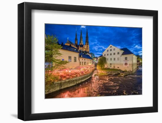 Sweden, Central Sweden, Uppsala, Domkyrka Cathedral with riverfront cafe, dusk-Walter Bibikow-Framed Photographic Print