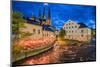 Sweden, Central Sweden, Uppsala, Domkyrka Cathedral with riverfront cafe, dusk-Walter Bibikow-Mounted Photographic Print