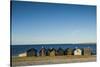 Sweden, Faro Island, Kursviken, coastal farmers fishing shacks, sunset-Walter Bibikow-Stretched Canvas