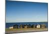 Sweden, Faro Island, Kursviken, coastal farmers fishing shacks, sunset-Walter Bibikow-Mounted Photographic Print