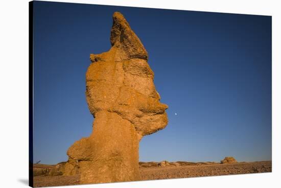 Sweden, Faro Island, Langhammars Area, Langhammar coastal limestone rauk rock, sunset-Walter Bibikow-Stretched Canvas