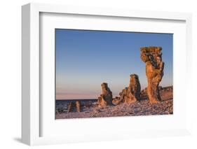 Sweden, Faro Island, Langhammars Area, Langhammar coastal limestone rauk rock, sunset-Walter Bibikow-Framed Photographic Print