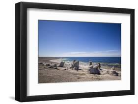 Sweden, Faro Island, Langhammars Area, Langhammar coastal limestone rauk rocks with visitors-Walter Bibikow-Framed Photographic Print