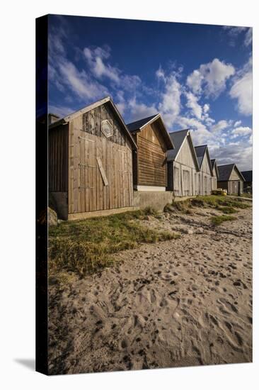 Sweden, Gotland Island, Djupvik, fishing shacks-Walter Bibikow-Stretched Canvas