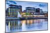 Sweden, Lake Vattern Area, Jonkoping, renovated harbor area along Munksjon Bay, dusk-Walter Bibikow-Mounted Photographic Print