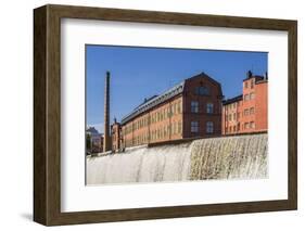 Sweden, Norrkoping, early Swedish industrial town, factory buildings and waterfall-Walter Bibikow-Framed Photographic Print