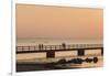 Sweden, Scania, Malmo, Riberborgs Stranden beach area, pier at sunset-Walter Bibikow-Framed Photographic Print