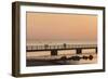 Sweden, Scania, Malmo, Riberborgs Stranden beach area, pier at sunset-Walter Bibikow-Framed Photographic Print