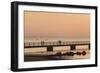 Sweden, Scania, Malmo, Riberborgs Stranden beach area, pier at sunset-Walter Bibikow-Framed Photographic Print