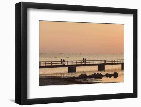 Sweden, Scania, Malmo, Riberborgs Stranden beach area, pier at sunset-Walter Bibikow-Framed Photographic Print