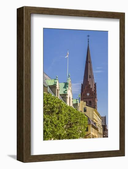 Sweden, Scania, Malmo, Sankt Petri Krka church and city buildings-Walter Bibikow-Framed Photographic Print