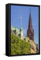 Sweden, Scania, Malmo, Sankt Petri Krka church and city buildings-Walter Bibikow-Framed Stretched Canvas