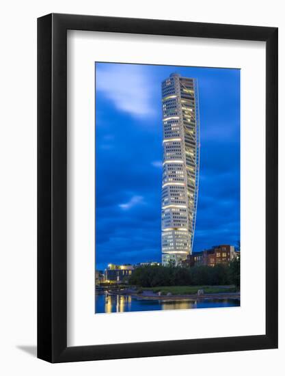 Sweden, Scania, Malmo, Turning Torso building, designed by architect Santiago Calatrava, 2005, dusk-Walter Bibikow-Framed Photographic Print