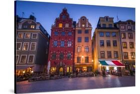 Sweden, Stockholm, Gamla Stan, Old Town, buildings of the Stortorget Square, dusk-Walter Bibikow-Stretched Canvas