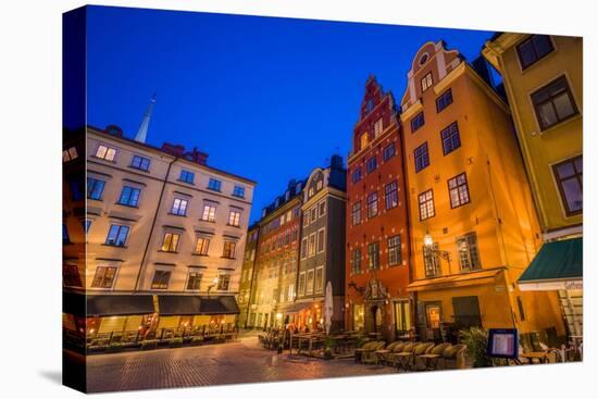 Sweden, Stockholm, Gamla Stan, Old Town, buildings of the Stortorget Square, dusk-Walter Bibikow-Stretched Canvas