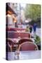 Sweden, Stockholm, Gamla Stan, Old Town, cafe tables-Walter Bibikow-Stretched Canvas