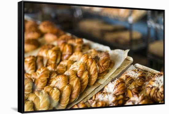 Sweden, Stockholm, Gamla Stan, Old Town, old town bakery, traditional cardamon buns-Walter Bibikow-Framed Stretched Canvas