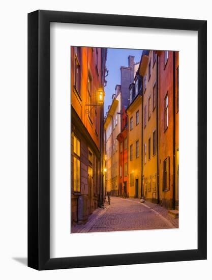 Sweden, Stockholm, Gamla Stan, Old Town, Royal Palace, old town street, dusk-Walter Bibikow-Framed Photographic Print