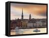 Sweden, Stockholm, Riddarfjarden, Gamla Stan, Passenger Ferries in Bay at Dusk-Shaun Egan-Framed Stretched Canvas