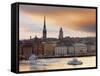 Sweden, Stockholm, Riddarfjarden, Gamla Stan, Passenger Ferries in Bay at Dusk-Shaun Egan-Framed Stretched Canvas