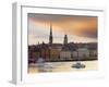 Sweden, Stockholm, Riddarfjarden, Gamla Stan, Passenger Ferries in Bay at Dusk-Shaun Egan-Framed Photographic Print