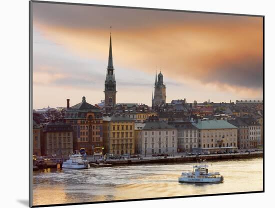 Sweden, Stockholm, Riddarfjarden, Gamla Stan, Passenger Ferries in Bay at Dusk-Shaun Egan-Mounted Photographic Print