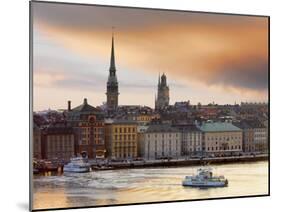 Sweden, Stockholm, Riddarfjarden, Gamla Stan, Passenger Ferries in Bay at Dusk-Shaun Egan-Mounted Photographic Print