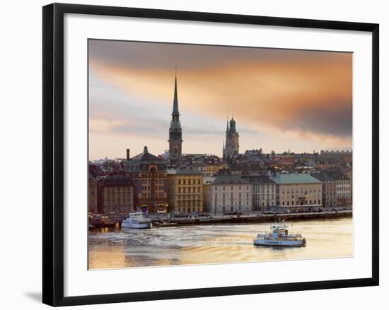 Sweden, Stockholm, Riddarfjarden, Gamla Stan, Passenger Ferries in Bay at Dusk-Shaun Egan-Framed Photographic Print