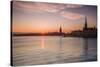 Sweden, Stockholm, Stockholm City Hall and Riddarholmen church, sunset-Walter Bibikow-Stretched Canvas