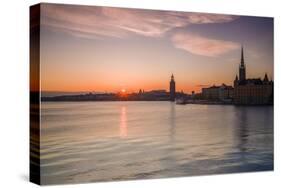 Sweden, Stockholm, Stockholm City Hall and Riddarholmen church, sunset-Walter Bibikow-Stretched Canvas